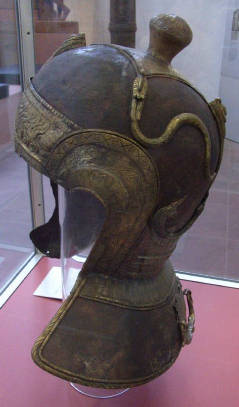 Roman Cavalry Helmet was found at Heddernheim in Germany. The helmet is of iron, with ...