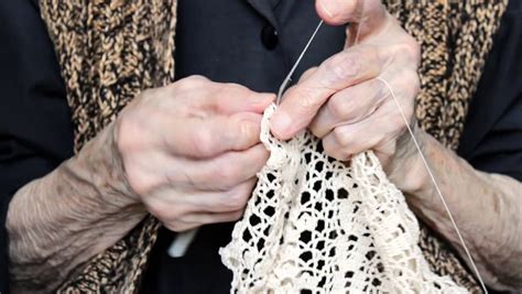 Close Up Of Hands Of An Elderly Woman Knitting A Blue Sweater 2 Stock Footage Video 8086627 ...