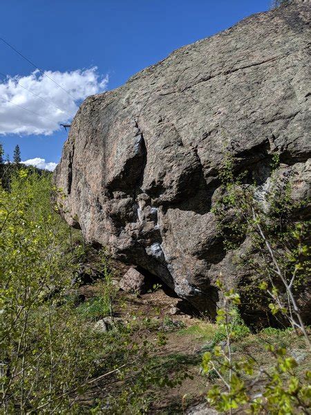 Climbing in Giant Boulder Uphill From Minturn Mile Boulder, Eagle/Vail/Minturn/Red Cliff