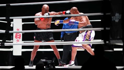 Photos: Mike Tyson, Roy Jones Jr. draws in exhibition boxing match