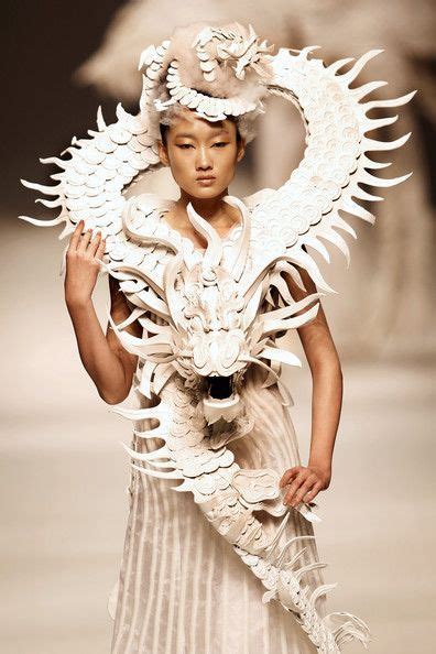 A model showcases designs on the catwalk during the ... | China fashion week, China fashion ...