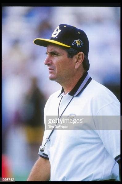 Coach Bill McCartney of the Colorado Buffaloes watches his players ...