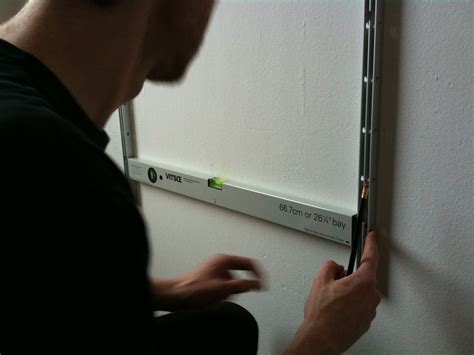 mounting the vitsoe 606 universal shelving system | www.vits… | Christophe Stoll | Flickr