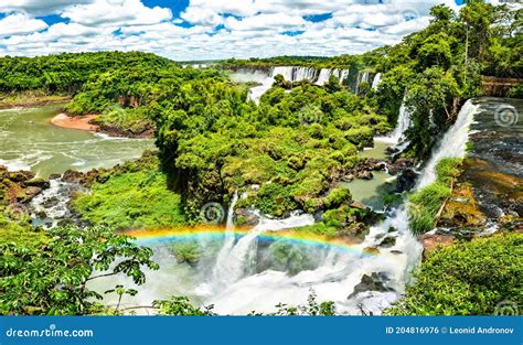 Rainbow At Iguazu Falls, The Largest Waterfall In The World, South America Royalty-Free Stock ...