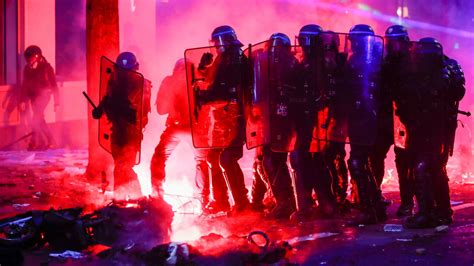 Paris protests: Police clash with protesters as violence flares at anti ...