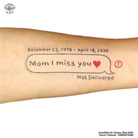 a woman's arm with a message on it that says mom i miss you not delivered