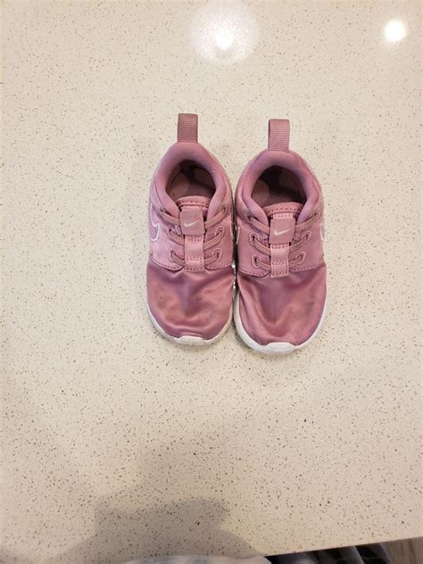 Pink little Nike sneakers. Toddler/Infant tennis shoes. Well loved. See pictures for use. Still ...