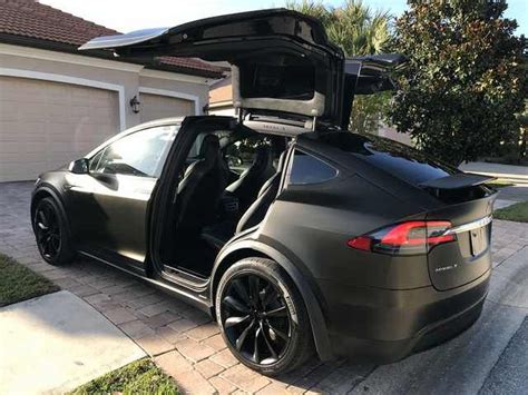 Tesla Model X Black Satin Gold Dust Vinyl Wrap with Carbon Fiber Accents on Chrome and all 6 ...