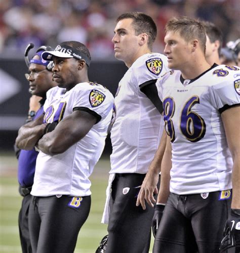 A glum-looking trio of Aquan Boldin, Joe Flacco and Todd Heap of the ...