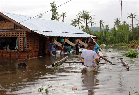 Tropical storm leaves 54 dead, 13 missing as it exits the Philippines ...