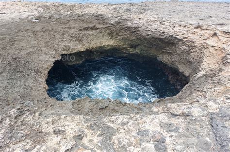 Underground spring with bubbling water. Stock Photo by alexandrabeganskaya