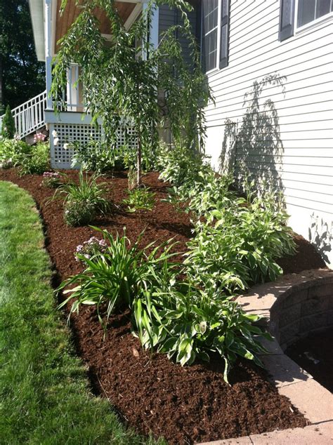 Bark Mulch for a Beautiful Yard in NH - Spring Landscaping Services