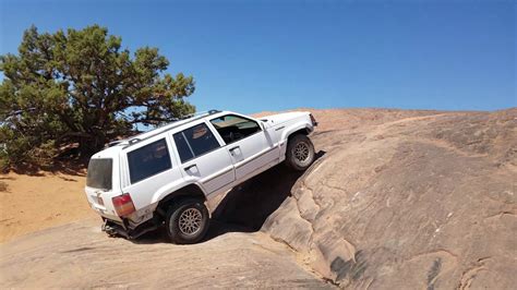 Moab rock crawling with stock Jeep - YouTube