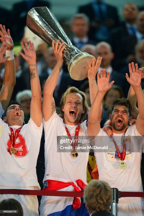 Ivan Rakitic of Sevilla lifts the Europa League trophy during the ...