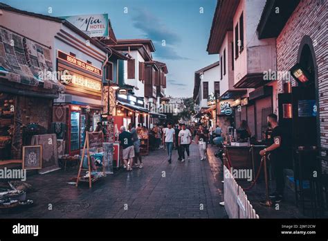 21 June 2022, Antalya, Turkey: Crowd of young tourist walking in Antalya old town - Kaleici ...