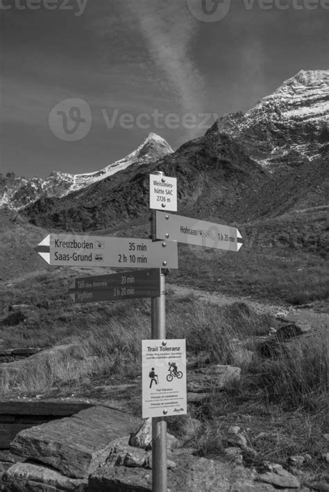 hiking in the swiss alps 12951567 Stock Photo at Vecteezy