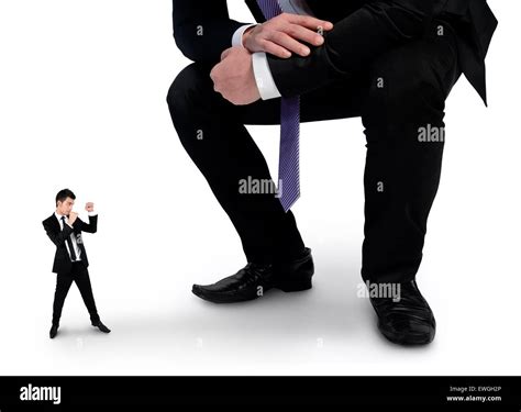 Isolated little business man fighting with boss Stock Photo - Alamy