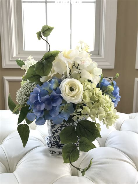 Blue hydrangea Arrangement in hand pained porcelain pot | Hydrangea arrangements, Blue hydrangea ...