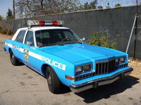 Los Angeles - 1989 Dodge Diplomat Blue&White "NYPD" Police Car | Police cars, Old police cars ...