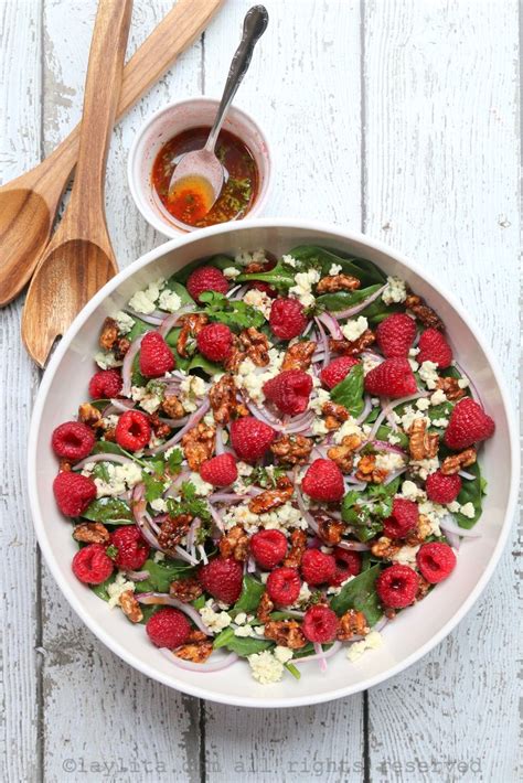 Spinach raspberry salad recipe with gorgonzola and honey roasted walnuts