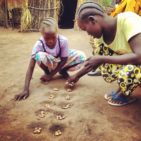 A young #refugee, who was recently reunited with her family in Yida camp, South Sudan, plays a ...