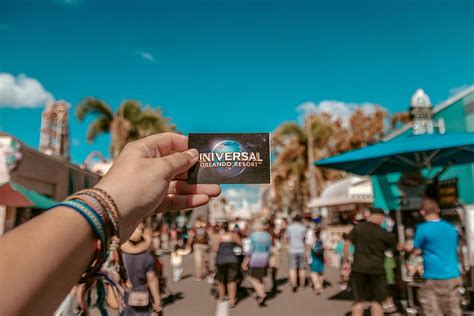 person, holding, universal, studios ticket, florida, fun, hand, orlando ...