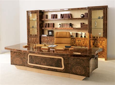 At R.A. Mobili the classic style of Italian-made burlwood and leather furniture for executive ...