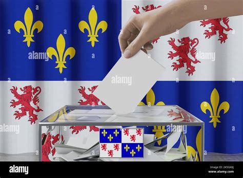 Picardie flag, hand dropping ballot card into a box - voting/ election concept - 3D illustration ...