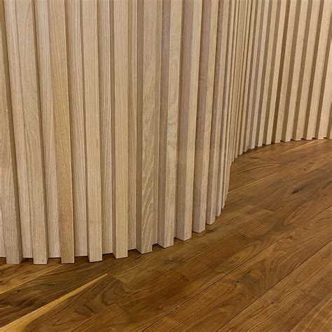 Curved Slat Wood Wall Paneling | Wooden wall panels, Wood slat wall, Wood panel walls