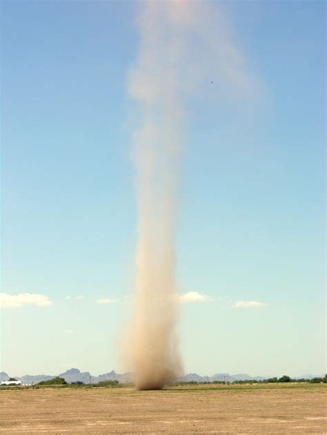 A large dust devil in the desert, photographed on 10 June 2005 in Arizona, USA. Photo credit ...