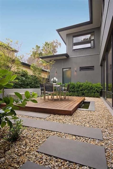 The small deck and decorative gravel add interest and warmth to the ...