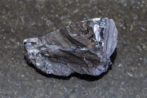 rough Anthracite coal on dark background 13037702 Stock Photo at Vecteezy