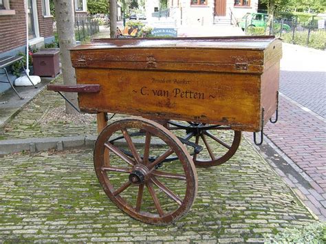 Old cart of a bakery by inyucho, via Flickr | Wooden wagon, Vintage carts, Wheel craft