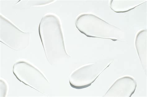 Premium Photo | Pattern cosmetic smears cream texture on white background