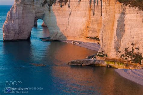 Sunset in Étretat | Sunset, Natural landmarks, Landscape