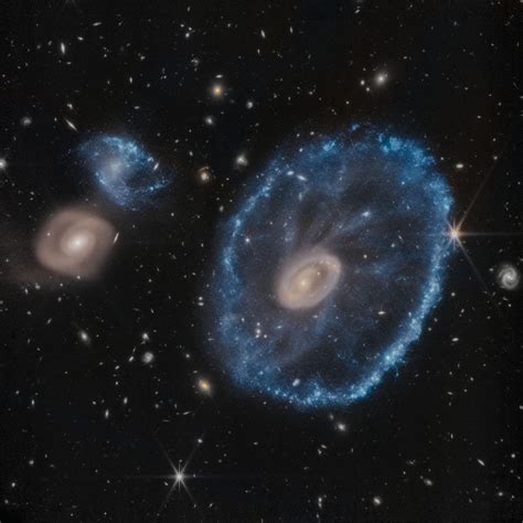 Cartwheel galaxy by Hubble and James Webb : r/Astronomy