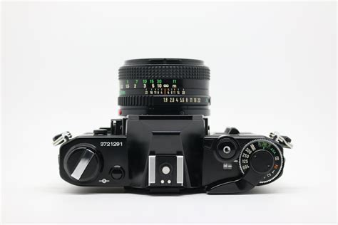 Canon AE-1 (Black Enamelled) & 50mm 1.8 FDn Lens – 305c