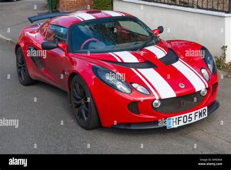 A 2005 registered red and white Lotus Elise sports car Stock Photo - Alamy