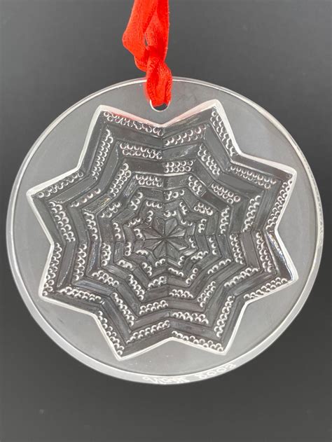 Lot - Lalique Clear Astre Star Snowflake Ornament