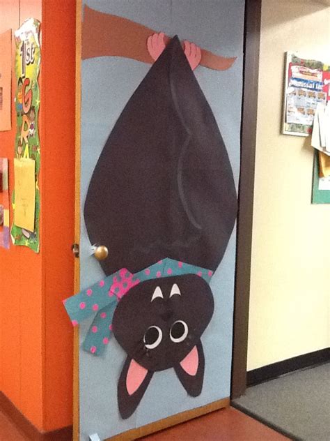 Bat door | Halloween classroom, Halloween classroom decorations, Halloween classroom door