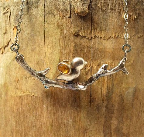 Serena Chen: Bird on a branch necklace