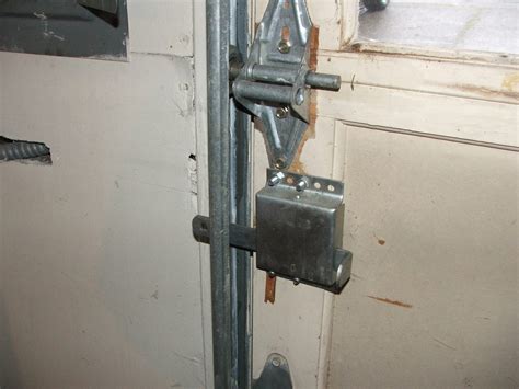 Has your garage door manual locking device been properly disabled? - Charles Buell Inspections Inc.