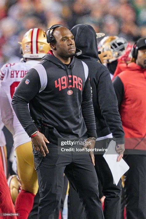 San Francisco 49ers defensive coordinator DeMeco Ryans looks on... News ...