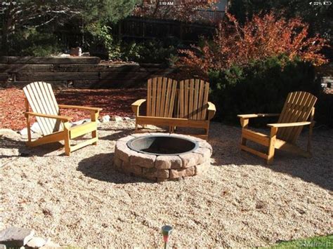 Pea gravel patio, adirondacks, fire pit, large cobble border (Castle ...