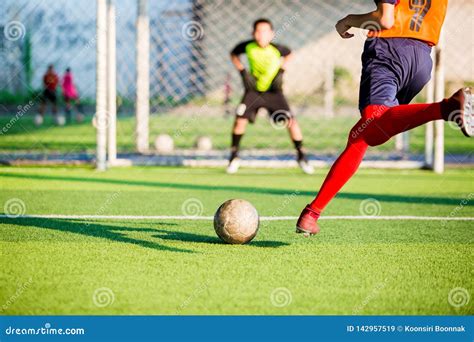 Soccer Player Run To Shoot Ball At Penalty Kick To Goal With Blurry ...