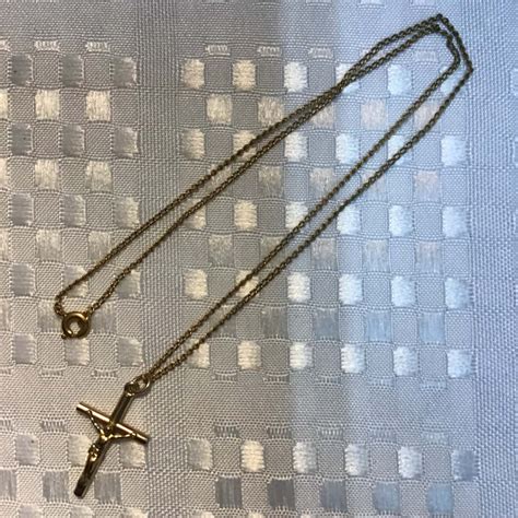 Womens 9ct gold cross on gold plated chain(s)