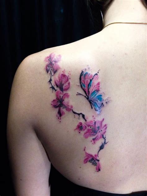 Watercolor cherry blossom with butterfly tattoo. | Tatuajes de acuarela, Tatuajes estilo ...