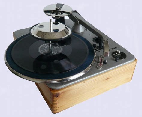 Dual 1001W, 78 rpm turntable with record changer. Record sizes can be ...