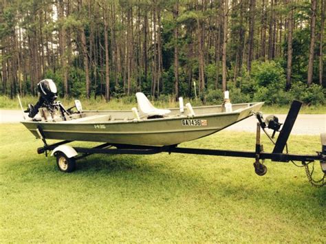 Item Gone! FS John boat, trailer new 9.9 motor | The Outdoors Trader