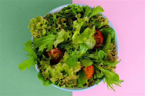 Bowl of mixed salad on bright, color background. 5432665 Stock Photo at Vecteezy